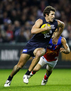 Jarrad Waite running away with the ball against Brisbane