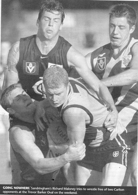 2000 Rd 17 Reserves - Kelly & Prendergast tackle opponent.